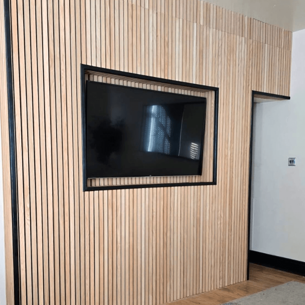 Slatted wood media wall feature Blackpool